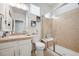 Clean bathroom with shower, toilet and vanity at 12039 Blackwell Way, Parker, CO 80138