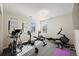 Home gym with various exercise equipment at 12039 Blackwell Way, Parker, CO 80138