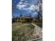 Charming single-story home with a spacious front yard and a welcoming porch at 1395 Havana St, Aurora, CO 80010