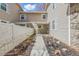Charming home featuring a quaint front porch and landscaped pathway leading to the entrance at 2752 S Heather Gardens Way, Aurora, CO 80014