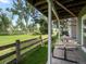 The backyard has an open lawn and a hammock on the porch at 7400 W Grant Ranch Blvd # 19, Littleton, CO 80123