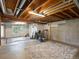 Unfinished basement with workout area and ample natural light at 7400 W Grant Ranch Blvd # 19, Littleton, CO 80123