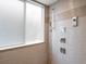 Modern bathroom shower featuring sleek fixtures and a textured tile wall at 7400 W Grant Ranch Blvd # 19, Littleton, CO 80123