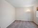 Bedroom is bright with large window, soft carpet and neutral walls at 7400 W Grant Ranch Blvd # 19, Littleton, CO 80123