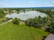 Beautiful lake with lush grassy surroundings, offering a tranquil environment at 7400 W Grant Ranch Blvd # 19, Littleton, CO 80123