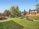 Grassy backyard featuring a shed and wooden fence at 3873 W 98Th Ave, Westminster, CO 80031