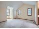 Bedroom with vaulted ceiling, neutral walls, and carpet flooring with natural light coming through windows at 3873 W 98Th Ave, Westminster, CO 80031