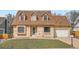 Traditional brick home with a well-kept lawn, offering a welcoming and classic curb appeal at 3873 W 98Th Ave, Westminster, CO 80031