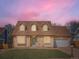 Charming two-story brick home with a manicured lawn and an attached garage, perfect for suburban living at 3873 W 98Th Ave, Westminster, CO 80031