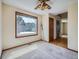 Comfortable room with large windows, hardwood floors, and ample natural light at 3873 W 98Th Ave, Westminster, CO 80031