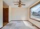 Cozy room with a ceiling fan, ample natural light, and potential for versatile use at 3873 W 98Th Ave, Westminster, CO 80031