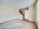 Spacious living room with neutral carpet and stairs, ready for personalized touches at 3873 W 98Th Ave, Westminster, CO 80031