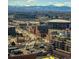 Breathtaking aerial view capturing Denver's skyline with the majestic Rocky Mountains as a backdrop at 1625 Larimer St # 2708, Denver, CO 80202