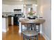 Charming dining area with a round table, modern bar stools, and a kitchen view, perfect for casual meals at 1625 Larimer St # 2708, Denver, CO 80202