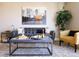 Cozy living room featuring a stylish sofa, decorative artwork, and a potted plant, creating a relaxing atmosphere at 1625 Larimer St # 2708, Denver, CO 80202
