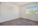 The bedroom has neutral carpet, a window with lots of natural light, and a large closet at 19172 E Arkansas Dr # 106, Aurora, CO 80017