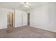 Spacious bedroom features an en-suite bathroom and a walk-in closet, offering comfort and convenience at 19172 E Arkansas Dr # 106, Aurora, CO 80017