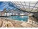 Indoor pool with lots of natural light and seating at 19172 E Arkansas Dr # 106, Aurora, CO 80017