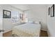 Cozy bedroom with natural light, a comfortable bed, and a serene atmosphere at 4401 Hydrangea Way, Castle Rock, CO 80109