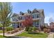 Inviting home exterior with large porch, steps, well-kept landscaping, and beautiful curb appeal at 4401 Hydrangea Way, Castle Rock, CO 80109