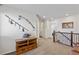 Upstairs hallway with railing that opens up to other rooms in the home at 4401 Hydrangea Way, Castle Rock, CO 80109