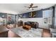 Comfortable living room featuring hardwood floors and a stylish decor at 4401 Hydrangea Way, Castle Rock, CO 80109