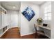 A cozy office nook features natural light, a granite countertop, and handy storage shelves at 4401 Hydrangea Way, Castle Rock, CO 80109
