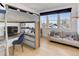 This room features a bunkbed, workstation, and lounge area with window views at 785 Delechant Dr, Erie, CO 80516