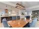 Elegant dining area and open kitchen layout create an inviting space for dining and entertaining at 785 Delechant Dr, Erie, CO 80516