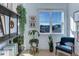 Bright office space featuring a wall of windows with neighborhood views and decor at 785 Delechant Dr, Erie, CO 80516