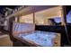 Backyard hot tub with integrated lighting, offering a luxurious and relaxing outdoor experience at 785 Delechant Dr, Erie, CO 80516