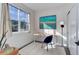 Home office space with natural light, desk, chair and closet with view to the outside at 785 Delechant Dr, Erie, CO 80516