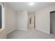 Well-lit bedroom with neutral walls, plush carpeting, and ample closet space for storage at 1878 W 32Nd Ave, Denver, CO 80211
