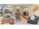 Comfortable living room with a fireplace, stylish decor, and natural light, creating a relaxing and inviting space at 1878 W 32Nd Ave, Denver, CO 80211
