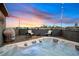 Enjoy evenings on this rooftop deck with a hot tub under festive string lights, overlooking the city at 1878 W 32Nd Ave, Denver, CO 80211