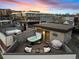 Relaxing rooftop deck with a private hot tub and string lights for outdoor enjoyment and skyline views at 1878 W 32Nd Ave, Denver, CO 80211