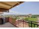 Balcony view overlooking a large park space with city view in the distance at 3675 S Cherokee St # 710, Englewood, CO 80110