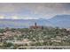 Panoramic view capturing a neighborhood with beautiful buildings and distant mountains at 3675 S Cherokee St # 710, Englewood, CO 80110