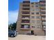 Exterior shot of a multi-story apartment building featuring private balconies and secure entry at 3675 S Cherokee St # 710, Englewood, CO 80110