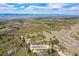 An aerial shot of the landscape at Daniels Park with scrub brush and natural vegetation at 534 Stonemont Dr, Castle Pines, CO 80108