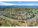 Residential area with tree-lined streets, a nearby golf course, and mountain views at 534 Stonemont Dr, Castle Pines, CO 80108