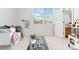 bedroom featuring a bed, toys, and hopscotch rug at 534 Stonemont Dr, Castle Pines, CO 80108