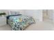 Cozy bedroom featuring a comfortable bed with stylish bedding and soft carpet at 534 Stonemont Dr, Castle Pines, CO 80108