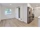 Inviting dining area with modern flooring, natural light, and open access to the kitchen at 5090 Tejon St, Denver, CO 80221