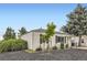 Charming single-story home with a well-maintained front yard and mature trees at 5090 Tejon St, Denver, CO 80221