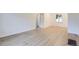 Bright living room with wood flooring and neutral paint for a modern, airy feel at 5090 Tejon St, Denver, CO 80221