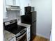 Kitchen featuring stainless steel appliances and bright white subway tile backsplash at 1633 18Th St St # 2, Boulder, CO 80302