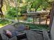 Exterior view showing a patio with outdoor furniture and mature trees at 1633 18Th St St # 2, Boulder, CO 80302