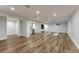Spacious finished basement with ample room for recreation, entertainment, and a stylish wet bar area at 5795 Oak Creek Ln, Greenwood Village, CO 80121