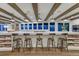 Modern kitchen with a long island and seating, perfect for entertaining guests at 5795 Oak Creek Ln, Greenwood Village, CO 80121